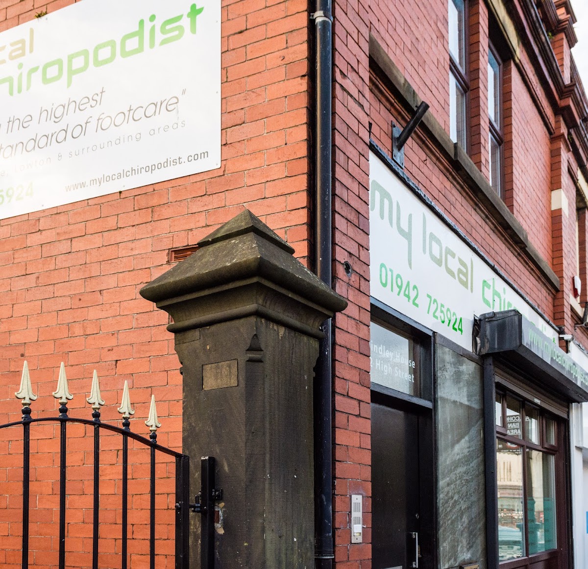 Signage above the clinic on Golborne High Street