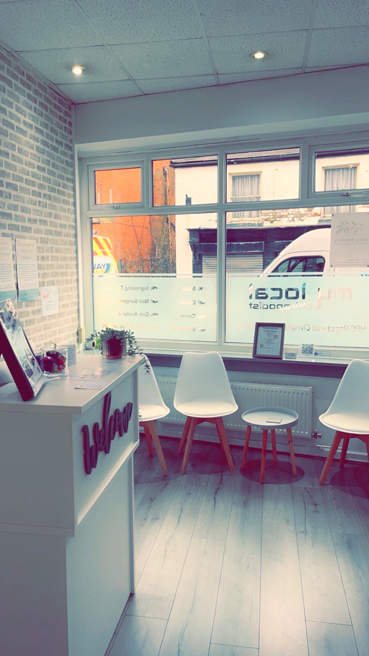 Inside the clinic, looking out onto Golborne High Street