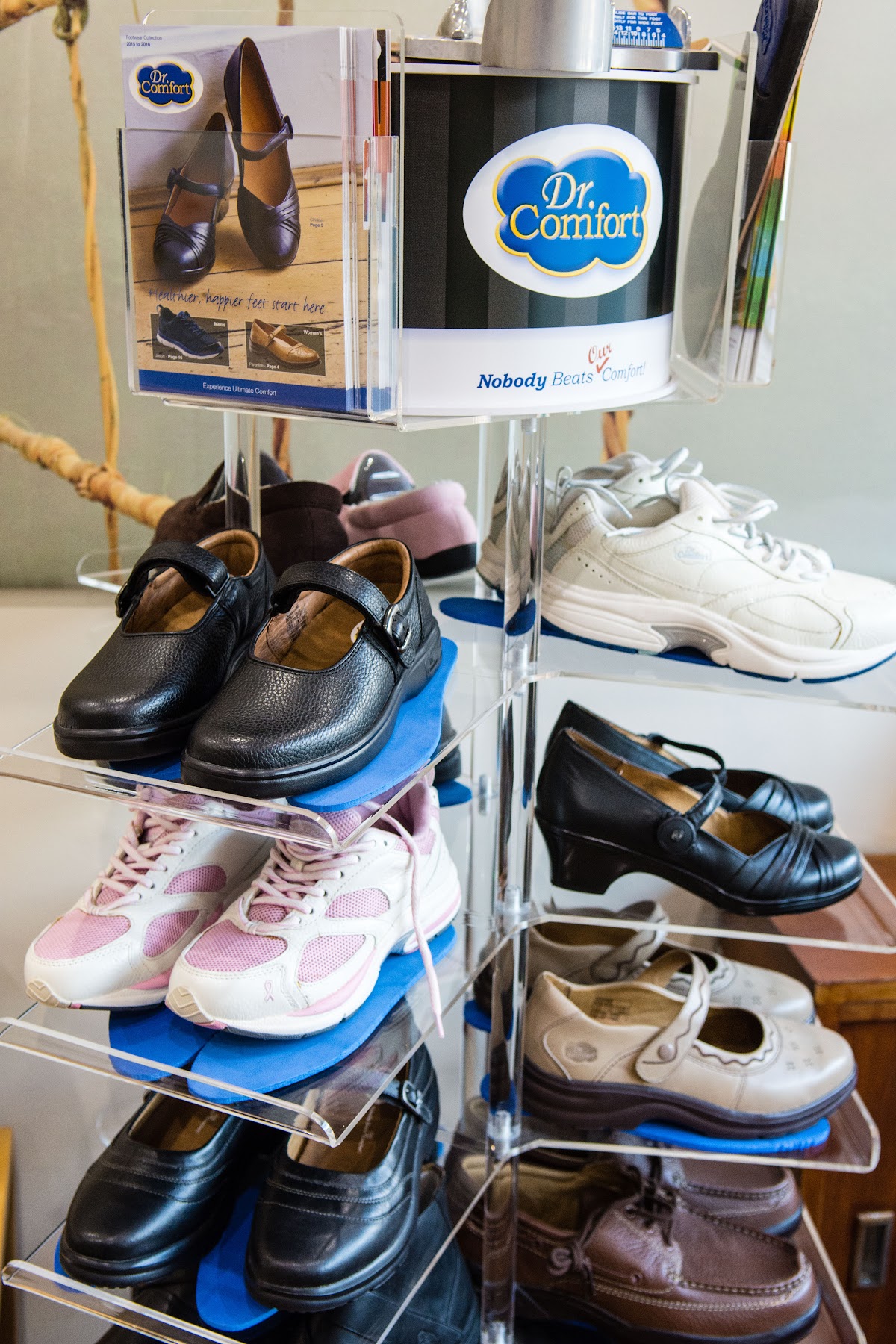 A rack of Dr. Comfort therapeutic footwear